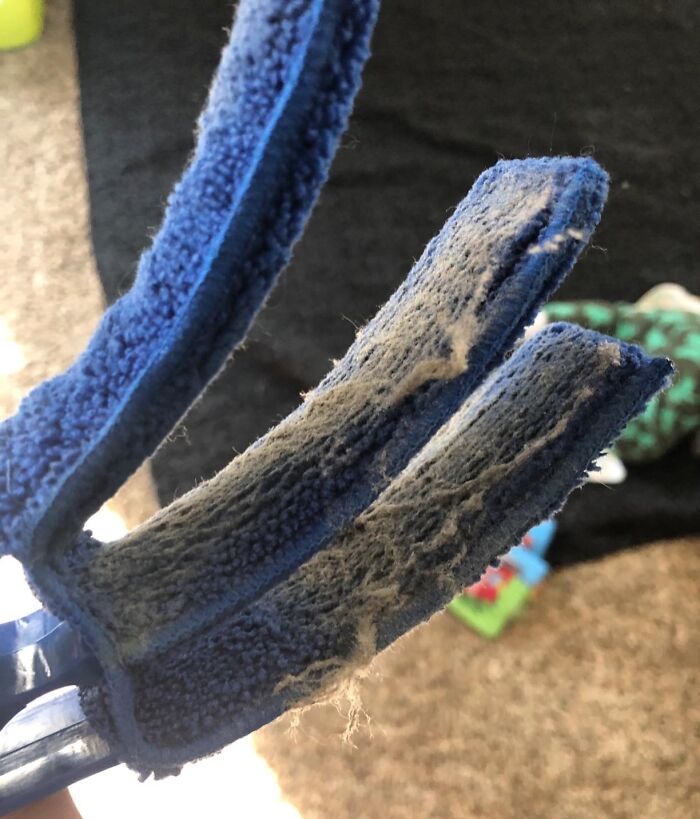 Blue cleaning tool covered in dust showing a product to help get full security deposit back from landlord.