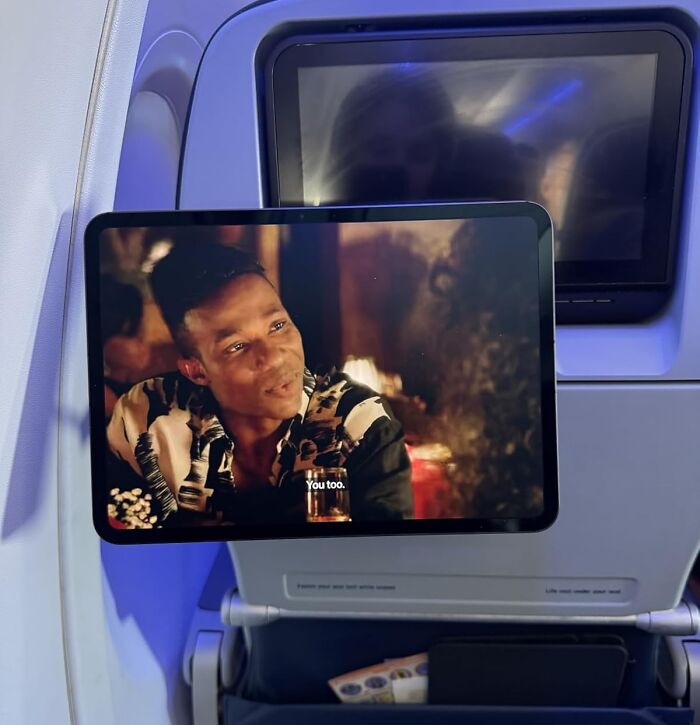 That Awkward Moment When Your In-Flight Movie Setup Collapses And Wakes Up Your Snoozing Neighbor Is Now A Thing Of The Past With An In-Flight Cellphone Stand 