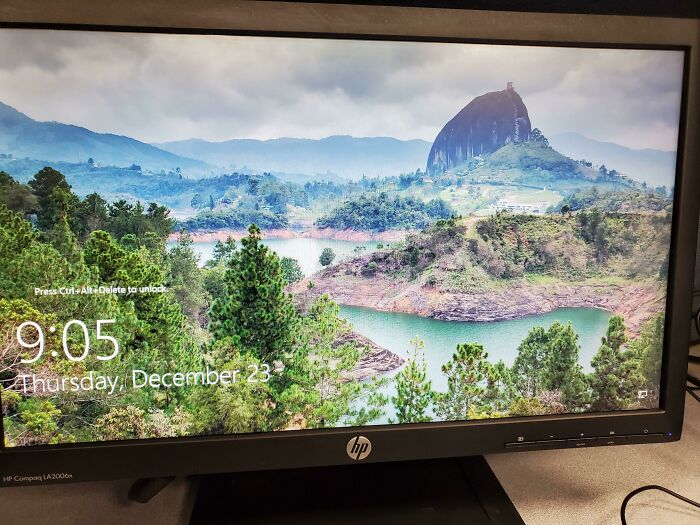 Scenic landscape with lush greenery, a river, and a distinctive rock formation in a popular where was this taken post.