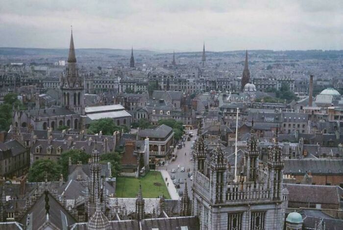 A historic cityscape with Gothic spires and old buildings, illustrating a where was this taken internet post.