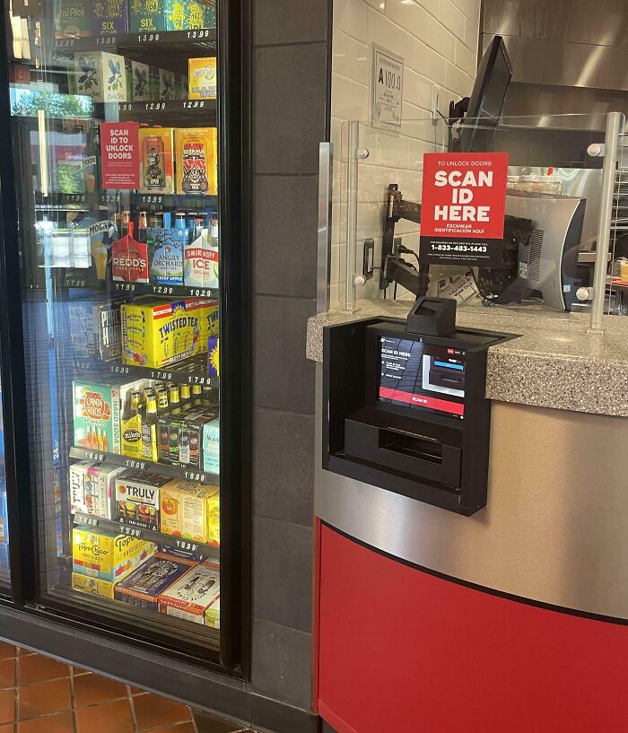 Self-check ID scanner in a store entrance solves access control, demonstrating smart ideas and inventions that solve problems.