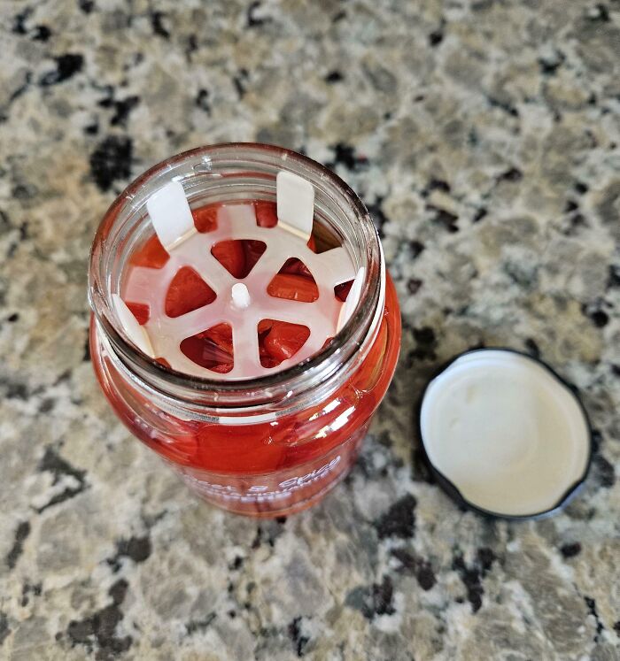 Plastic insert inside a ketchup bottle, a smart idea invention designed to solve pouring problems and reduce mess.