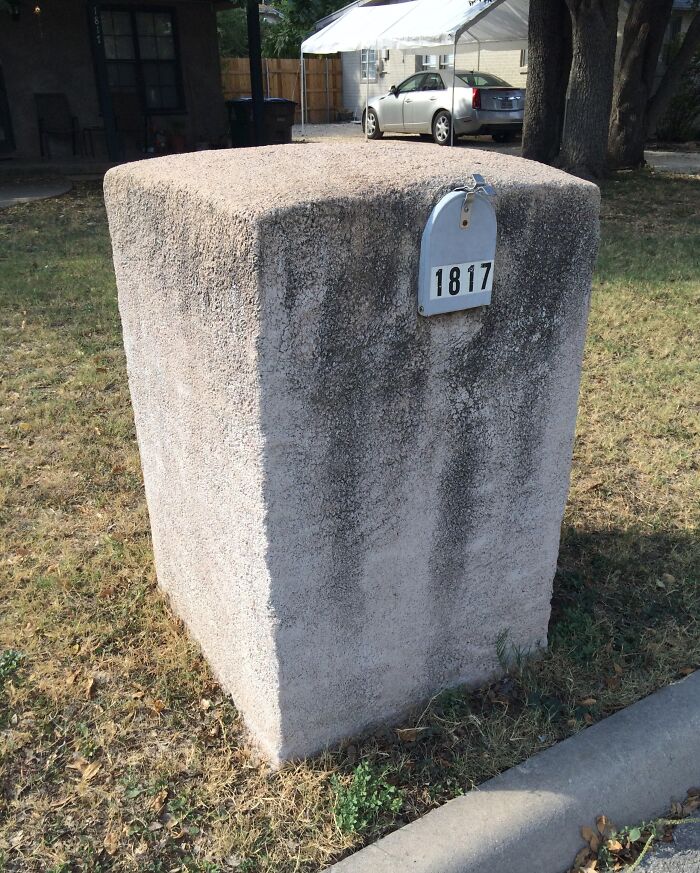 Concrete block mailbox with house number 1817, an example of creative and cool mailboxes spotted in the wild.