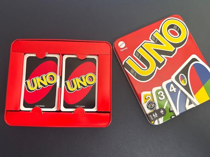 UNO card game open in a red tin box, showing two decks, ideal stocking stuffer gift for holiday presents.