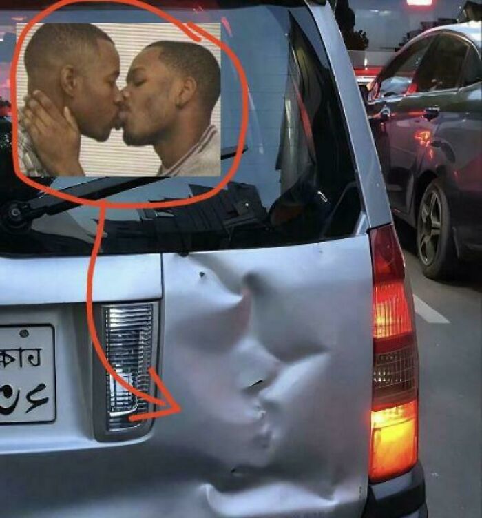 Car dent resembling two men kissing, illustrating things that look like or remind people of other things.
