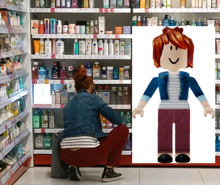 Person in a store wearing a denim jacket and red pants, resembling a toy figure with similar outfit and hair color.