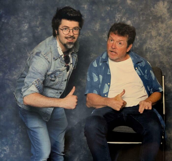 Two men giving thumbs up, showcasing dreams turned into reality and inspiring internet achievements.