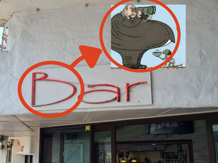 Outdoor bar sign with a letter shaped like a man with binoculars, one of the things that look like other things.