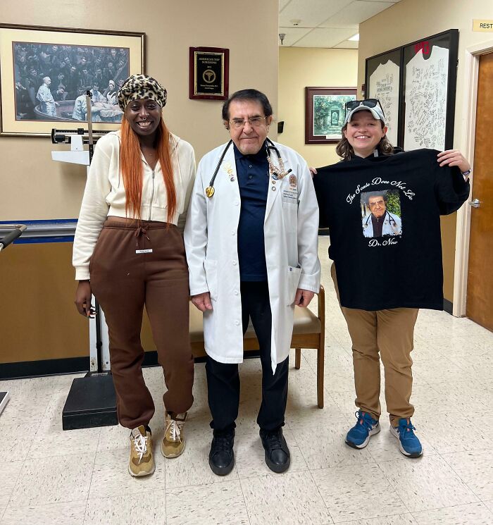 Three people smiling in a medical office, celebrating turning their big and small dreams into reality.