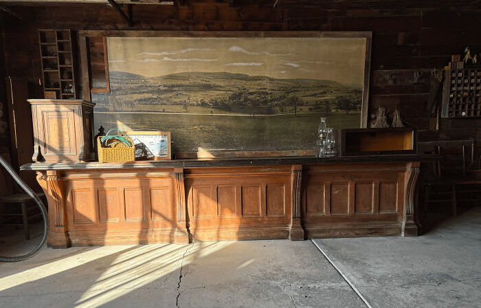 Wooden counter in an old house interior showcasing craftsmanship that has stood the test of time with vintage decor.