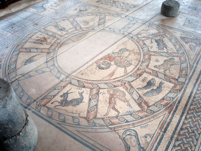 Ancient mosaic floor featuring zodiac signs and mythological figures, a fascinating archeology find from around the world.