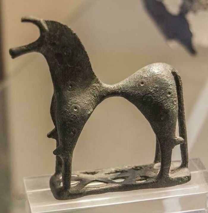 Ancient bronze artifact shaped like an animal, one of the fascinating archeology finds from around the world.