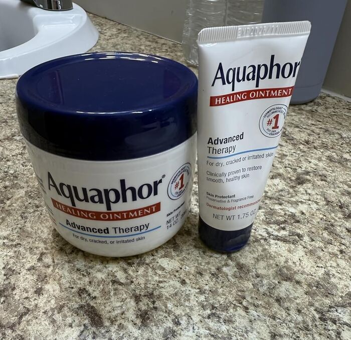 Aquaphor healing ointment jars on countertop as part of holy grail beauty deals for Black Friday restocking.