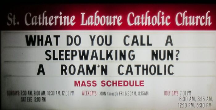 Church sign joke at St. Catherine Labouré Catholic Church about a sleepwalking nun being a Roam’n Catholic.