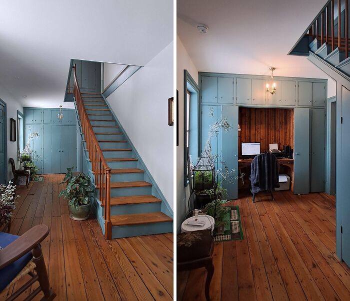 Interior of a beautiful old house showing craftsmanship with wooden floors, blue cabinetry, and a staircase design.