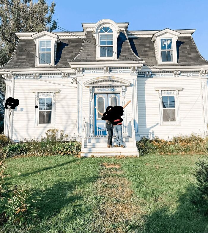 Beautiful old house with intricate craftsmanship, classic architecture, and well-preserved historic details on a sunny day.