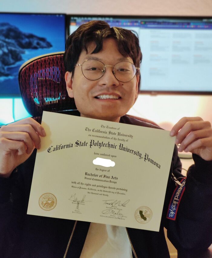 Person proudly holding a university diploma, celebrating turning dreams into reality and inspiring the internet.