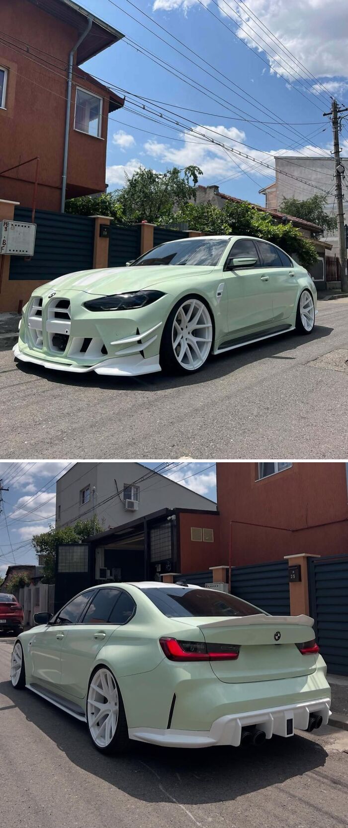 Modified BMW sedan with oversized white rims and custom body kit, showcasing failed attempts to make cars cooler.