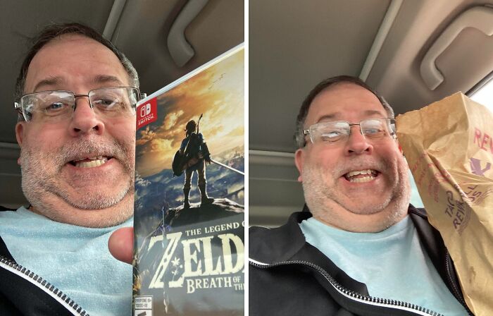 Man smiling inside a car showing Nintendo Switch Zelda game and holding a paper bag, capturing wholesome internet moments.