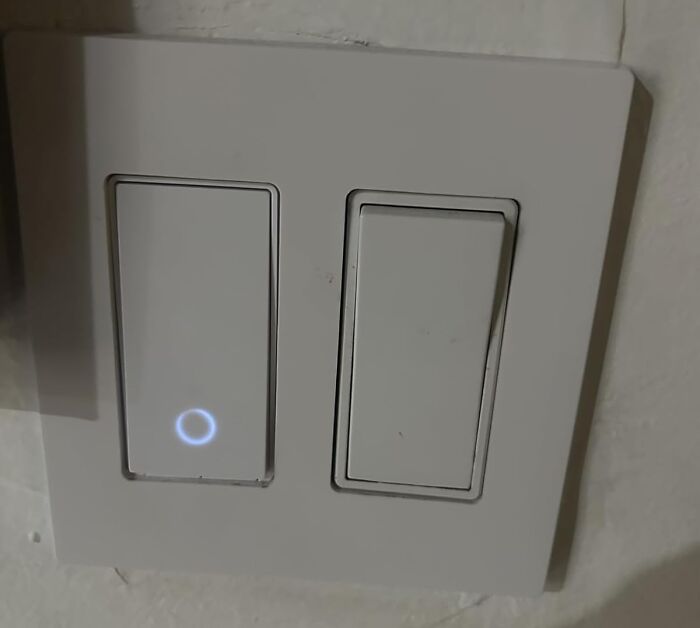 Smart home light switches on a wall, showcasing modern technology perfect for Black Friday tech deals.
