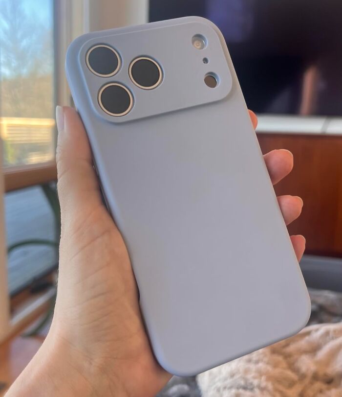 Smartphone with a sleek case held in hand, featured in Alix Earle’s Amazon store Black Friday deals collection.