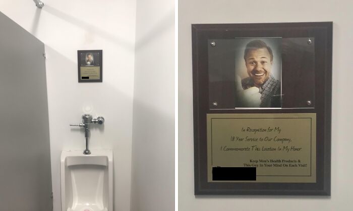 Plaque with a humorous tribute to an employee placed above a urinal, showcasing employee jokes and pranks.