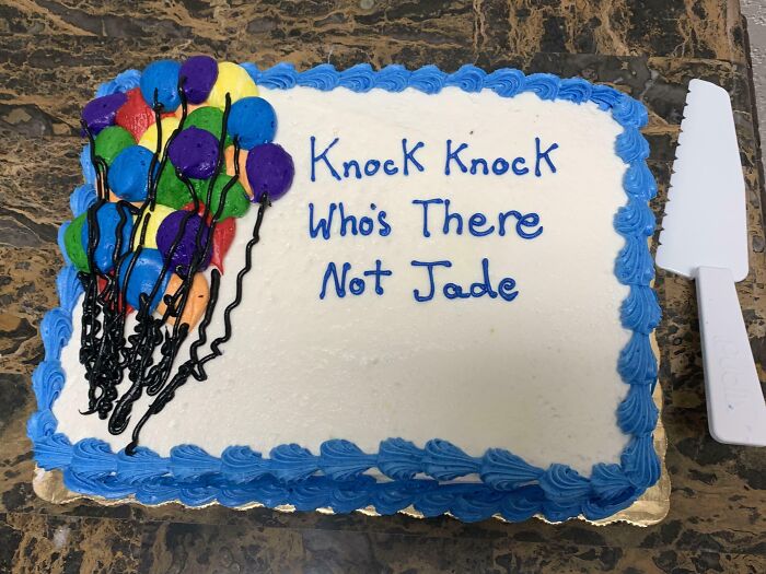 Cake with colorful balloons and a prank farewell message, showcasing employees walking out with jokes and pranks humor.