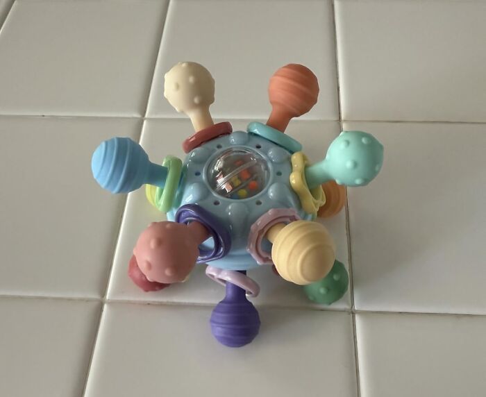 Colorful sensory toy with textured handles designed for kids, featured in Black Friday week deals on kids toys.