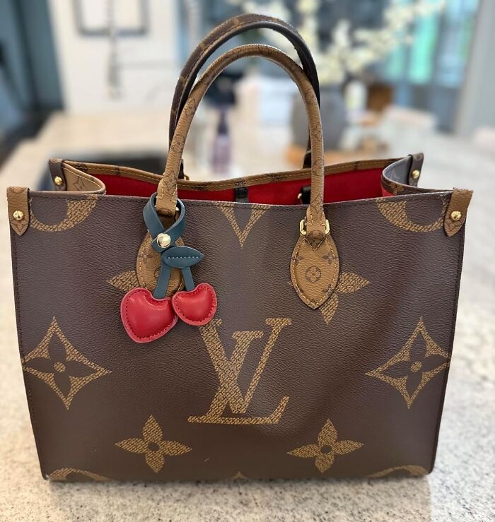  Your Purse Is About To Look Sweet Enough To Eat Thanks To This Cherry Bag Charm 