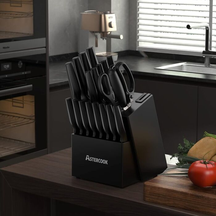 Black Friday deals on AsterCook knife set and kitchen scissors displayed on a modern kitchen countertop.