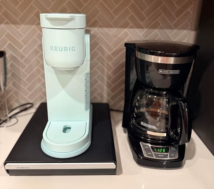 White Keurig and black Black+Decker coffee makers on kitchen counter, highlighting Cyber Monday biggest steals deals.