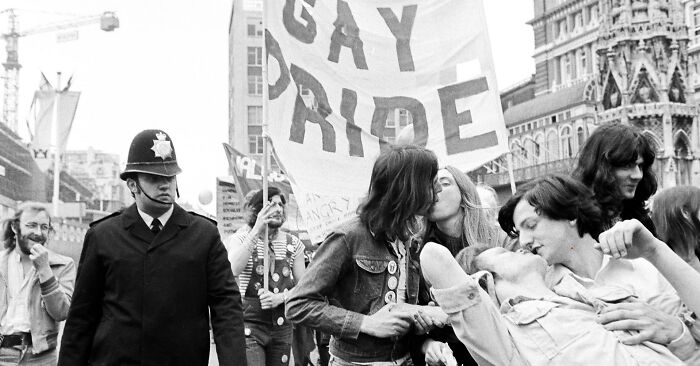 Black and white portrait capturing the strength and diversity of humans at a historic gay pride event.