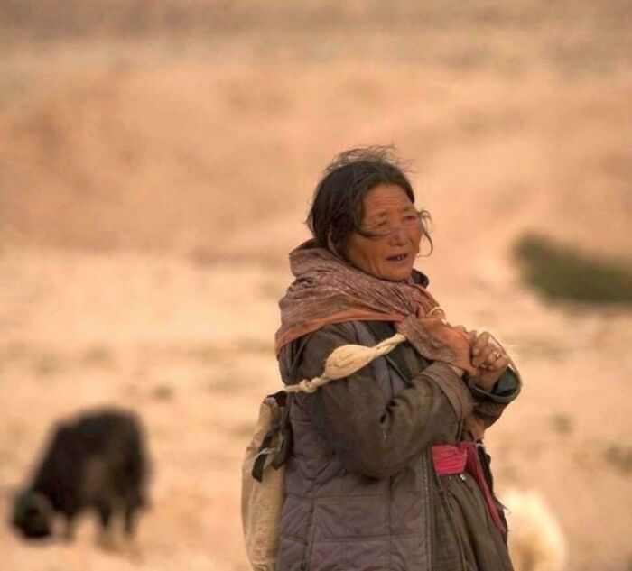 Portrait of an elderly woman in traditional clothing showing the strength and diversity of humans often overlooked.