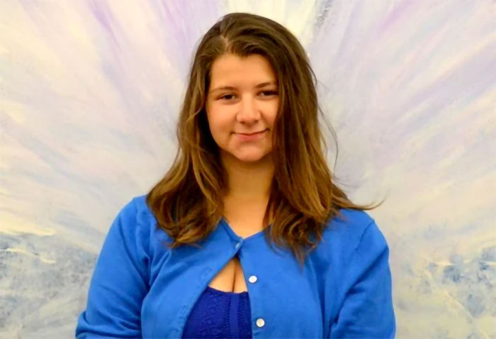 Young woman in a blue sweater, smiling softly in a portrait related to a disturbing Alaska case. Young woman in a blue sweater, smiling softly in a portrait related to a disturbing Alaska case.