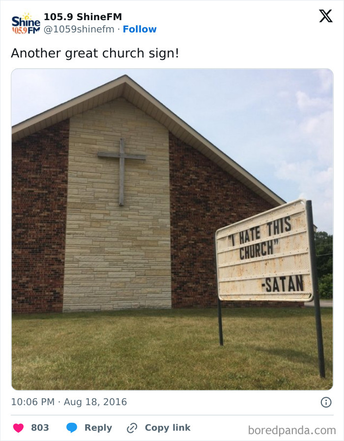 Church sign outside a brick building with a cross reads a humorous message attributed to Satan, part of church signs jokes.