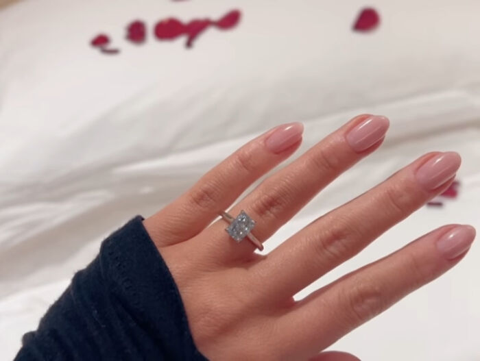 Close-up of a hand wearing a diamond ring, representing singer who accidentally married Malaysia&rsquo;s ex-king seeking divorce.
