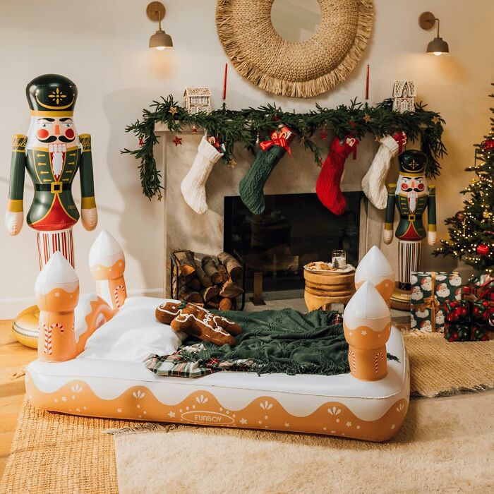 The Award For The Most Aggressively Festive Spare Bed In The Entire World Undoubtedly Goes To This Gingerbread House Blow Up Mattress 