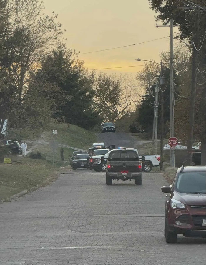 Police vehicles and investigators gather on a suburban street after step-uncle arrested in 14YO girl case near an RV. Police vehicles and investigators gather on a suburban street after step-uncle arrested in 14YO girl case near an RV.