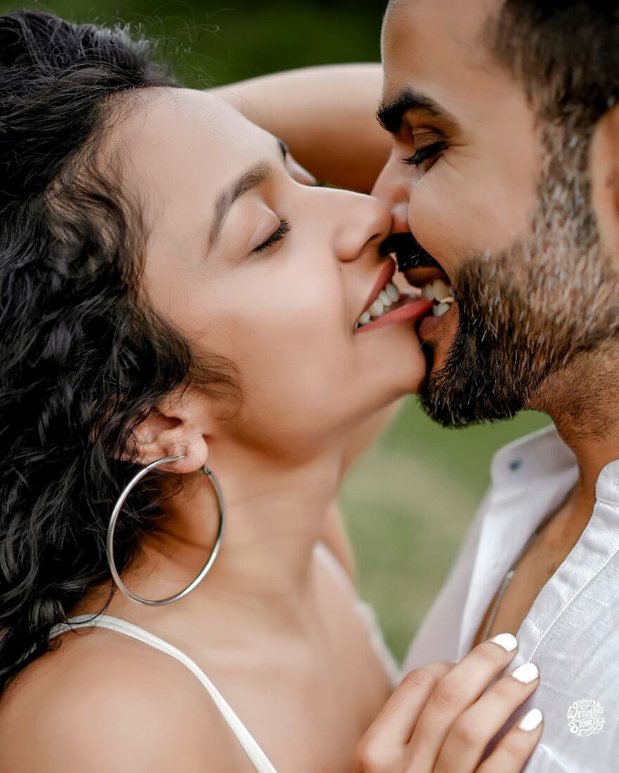 Closeup of a couple sharing a tender kiss, illustrating the various types of kisses and their cultural significance.