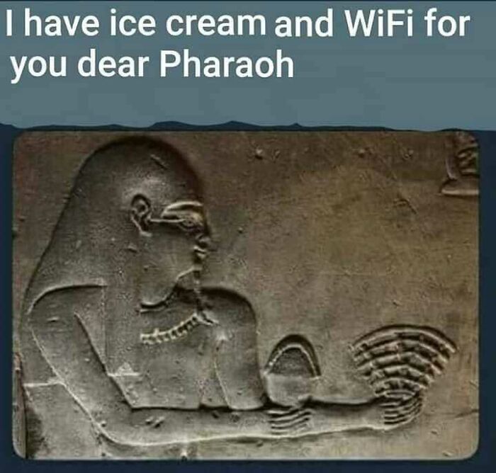 Ancient Egypt meme with carved stone showing pharaoh receiving ice cream and WiFi symbol, humorous hieroglyphics joke.