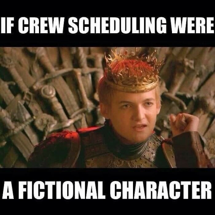 Scene from a popular TV show with a king wearing a crown, humorously captioned about aviation crew scheduling.