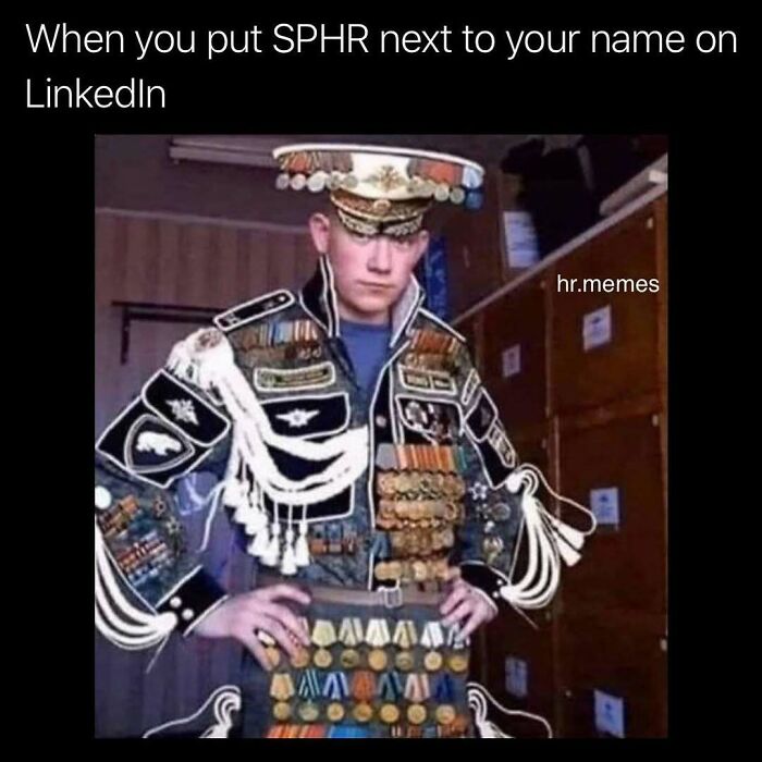 Person dressed in an extravagant uniform covered with medals, highlighting the chaos of working in human resources humorously.