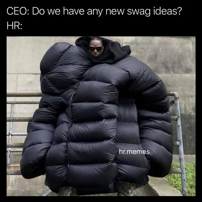Person wearing an oversized puffer jacket humorously representing the chaos of working in human resources and HR memes.