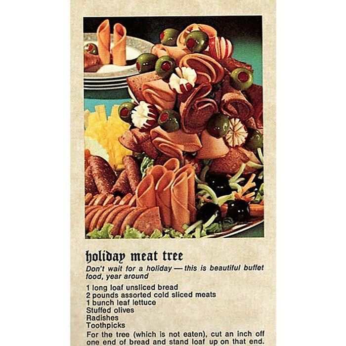 Vintage holiday meat tree recipe with cold sliced meats, stuffed olives, radishes, and assorted garnishes on a platter.