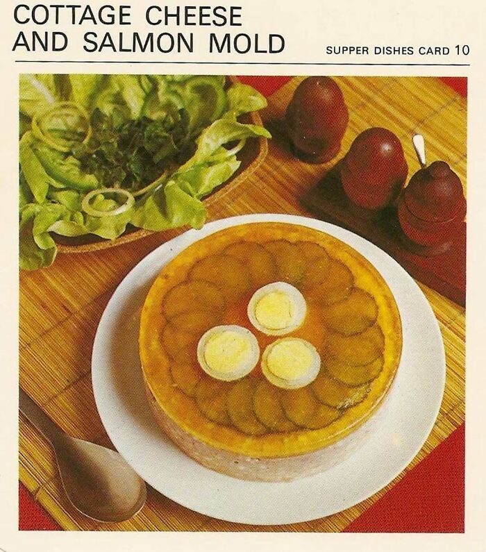 Vintage cottage cheese and salmon mold on a plate, showcasing disturbingly creative vintage recipes from Gen X era.