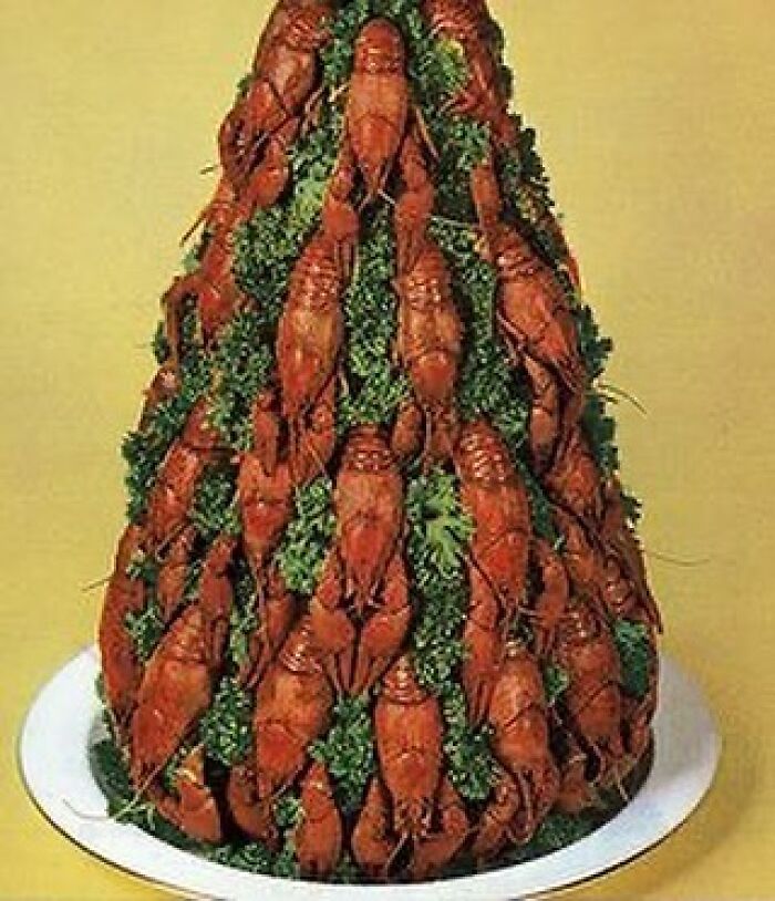 Vintage recipe display with arranged cooked crawfish and parsley in a creative cone shape, showcasing retro Gen X food presentation.