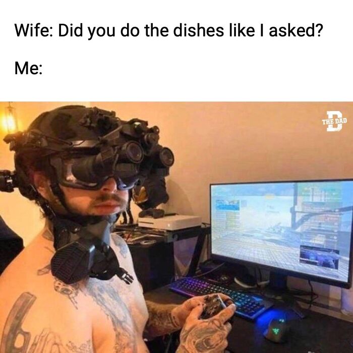 Man wearing tactical gaming headset and holding controller playing video game, funny memes for dads who want to game in peace.
