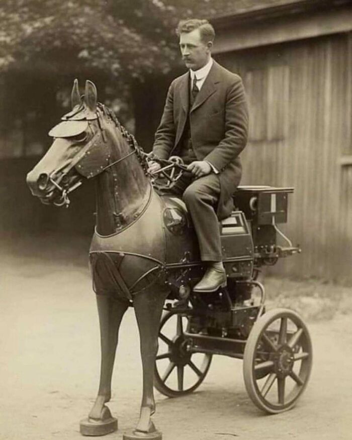 Victorian era man riding a mechanical horse carriage, showcasing weird photos that highlight a different time period.