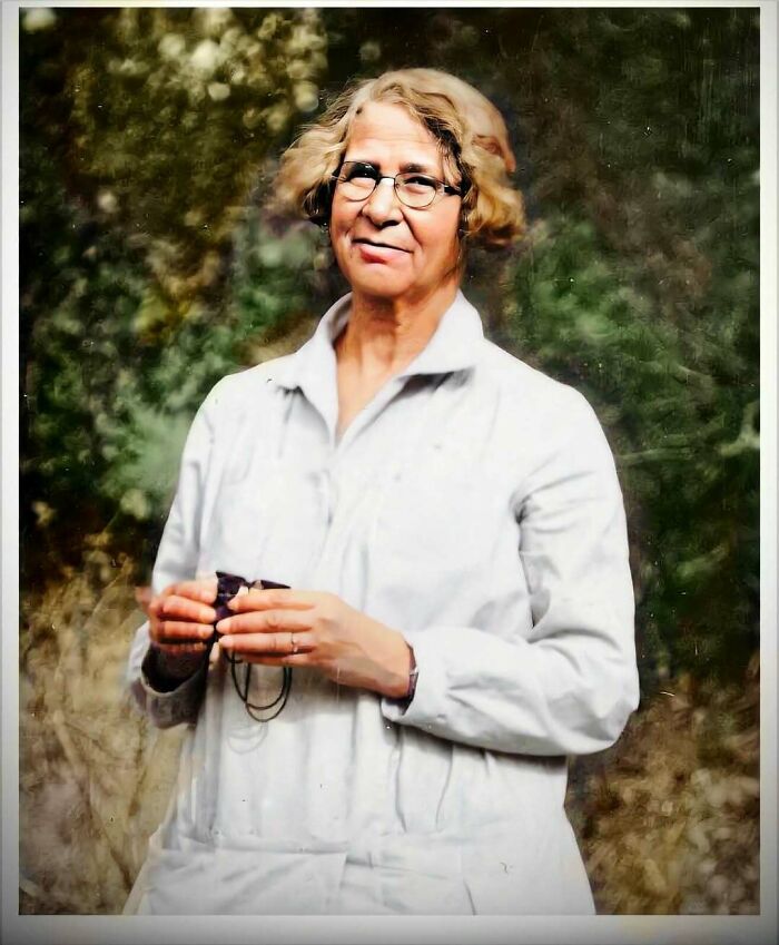 Portrait of an overlooked woman in history wearing glasses and white attire, highlighting important achievements in history.