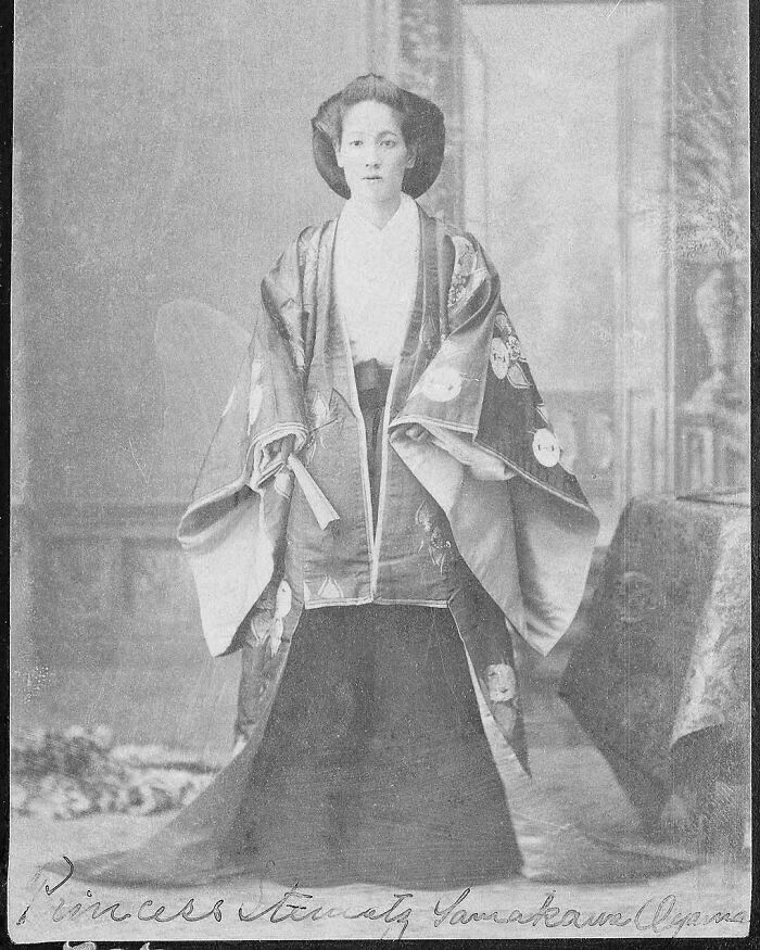 Historic black and white photograph of a woman in traditional attire representing overlooked women in history and achievements.